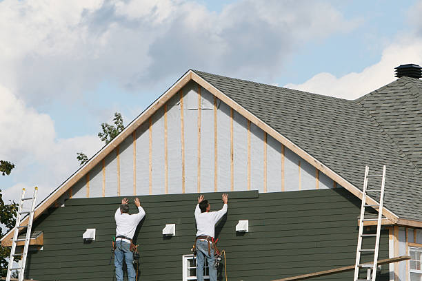 Professional Siding Contractor technician working in Monroeville, OH